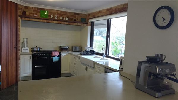 Mingah Mia Family Farm - The lower kitchen with the outside BBQ and enclosed vegetable garden outside. (7/10/2018 - Credits: Jo Jackson King)
